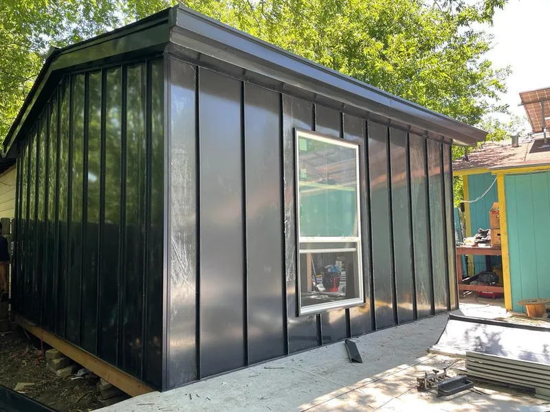 Black standing seam metal wall panels for Metal Roof Installation in Horseheads